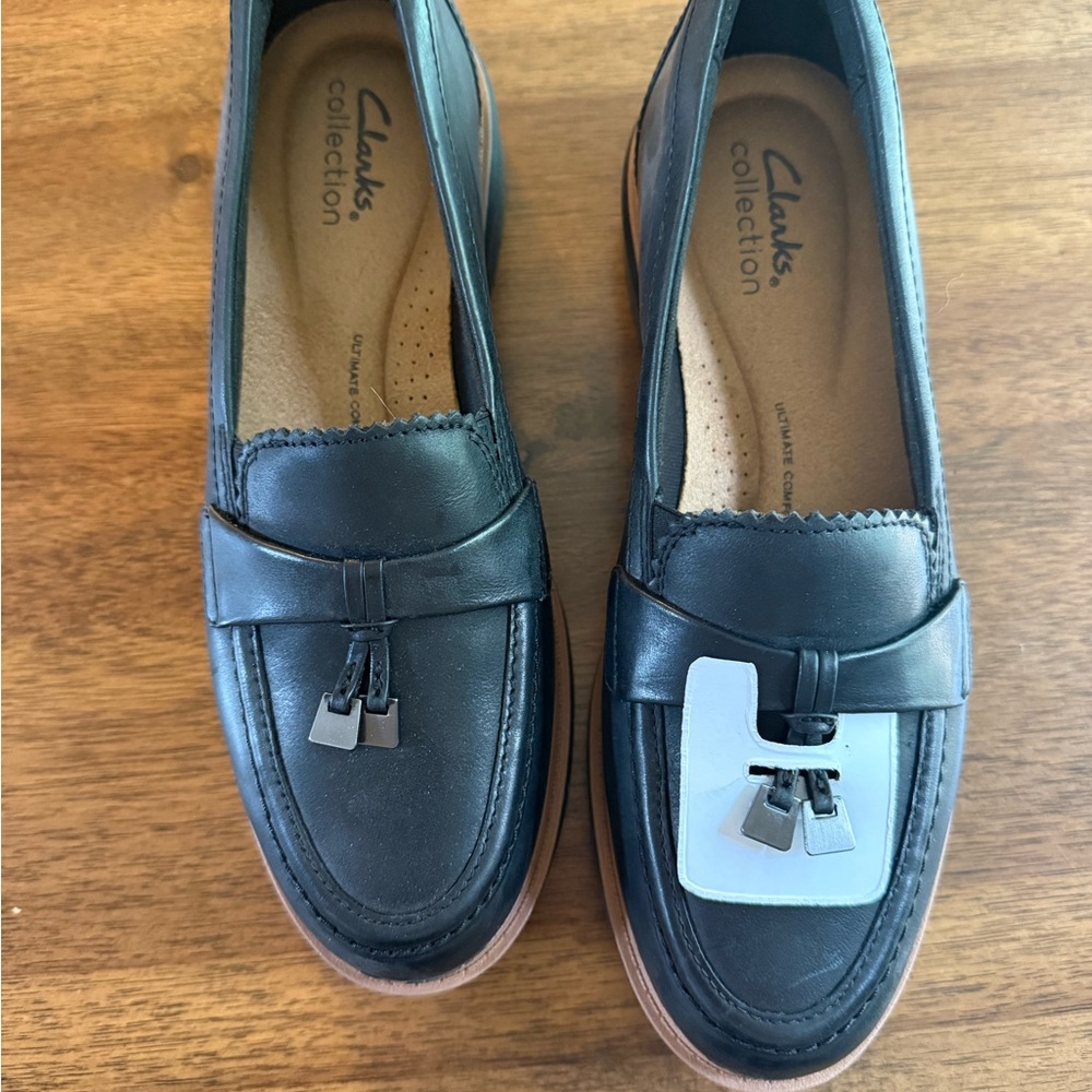 Clarks Black and Tan Loafers